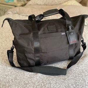 Brand New TUMI duffle travel bag